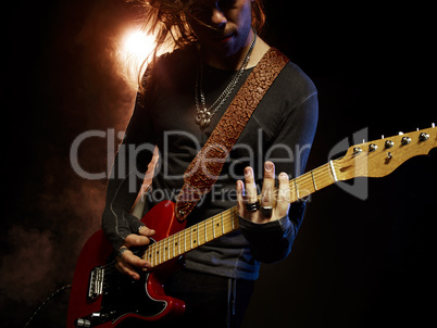 The guitarist plays solo. The guitarist plays solo.