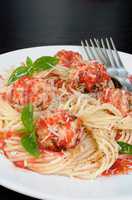 Pasta in tomato gravy with meatballs