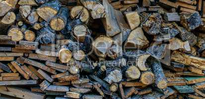 Pile of chopped firewood logs