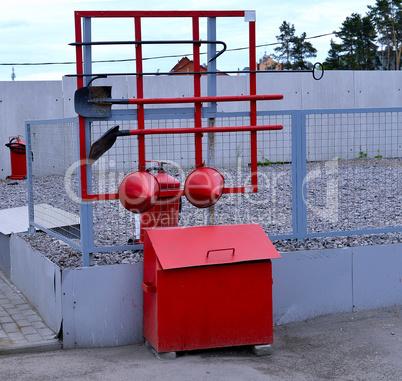 Fire Shield on the wall. Set primary fire extinguishing equipment.