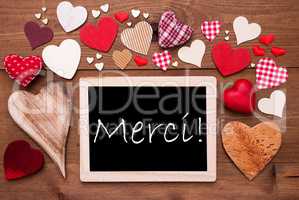 One Chalkbord, Many Red Hearts, Merci Means Thank  You