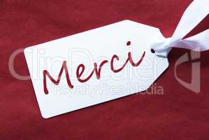 One Label On Red Background, Merci Means Thank You