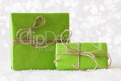 Two Green Gifts On Snow, Bokeh Effect