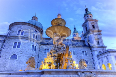 Fountain and cathedral at the Residenzplatz in Salzburg, Austria