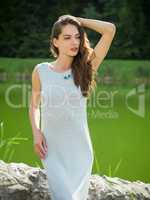 Beautiful young woman in a summer dress.