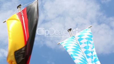 Germany and Bavaria flags in front of blue sky