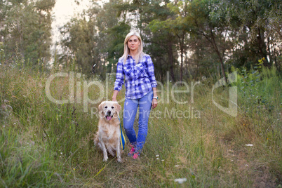 Girl walking with a dog