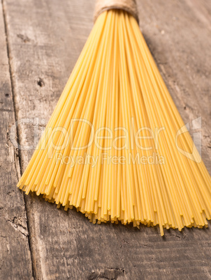 Spaghetti on a rustic wooden table