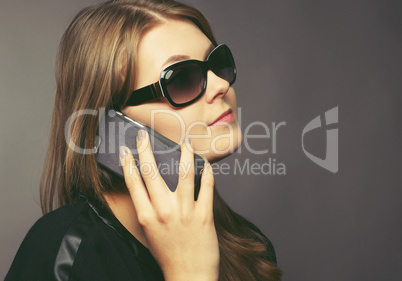 Young woman with a mobile phone