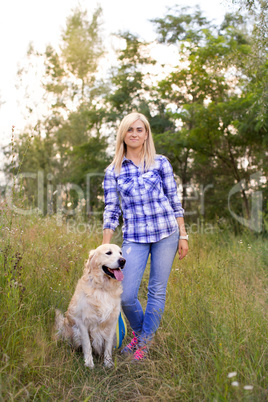 Girl walking with a dog