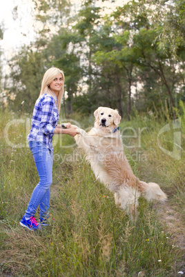 Girl walking with a dog