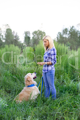 Girl walking with a dog