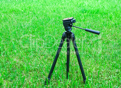 tripod for the camera on natural background