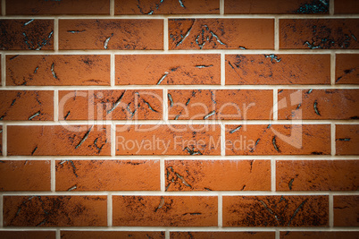 Brown texture tiles under brick