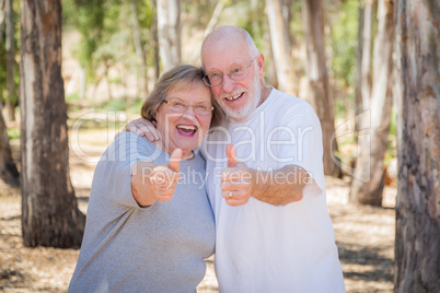 Happy Senior Couple GIve Thumbs Up