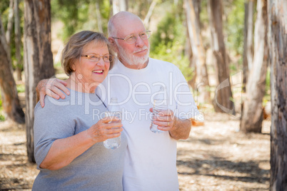 Fit Healthy Senior Couple with Water Bottles