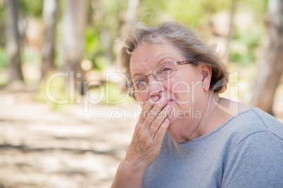 Upset Senior Woman Sitting Alone