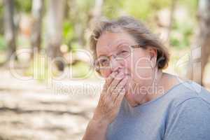 Upset Senior Woman Sitting Alone
