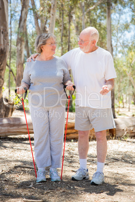 Happy Senior Couple Exercising Outside Together