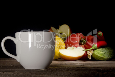 Cup of coffee, vegetables and fruits