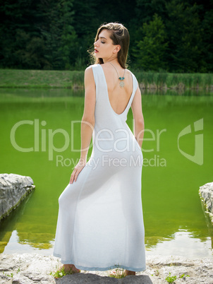 Beautiful young woman in a summer dress.