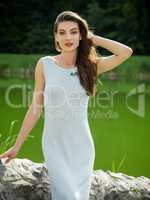 Beautiful young woman in a summer dress.