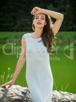 Beautiful young woman in a summer dress.