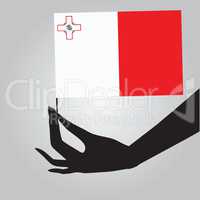 Hand with flag Malta