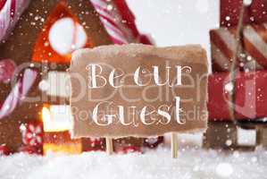 Gingerbread House With Sled, Snowflakes, Text Be Our Guest