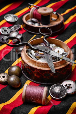 Spool of thread and buttons