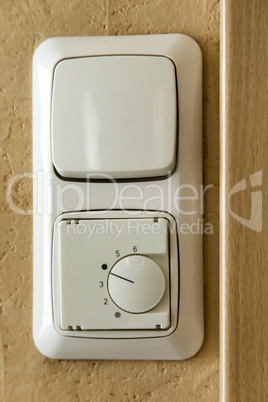 Light switch with temperature controller