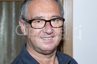 Portrait of a man with glasses