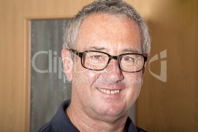 Portrait of a man with glasses