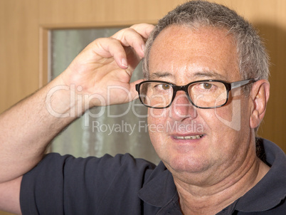 Portrait of a man with glasses