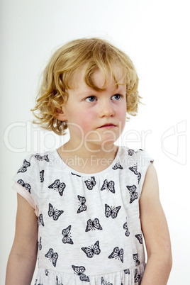 Portrait of a girl with blond hair and blue eyes