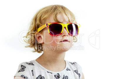 Portrait of a girl with blond hair and sunglasses