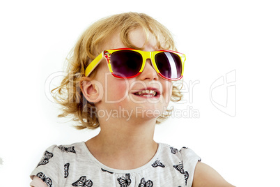 Portrait of a girl with blond hair and sunglasses