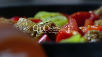 Closeup on pan fried chopped vegetables