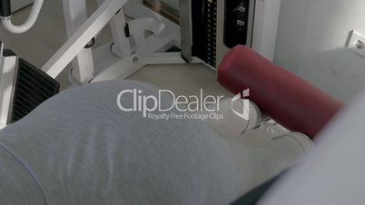 Training on back leg curl machine