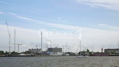 Boat sailing in city harbour