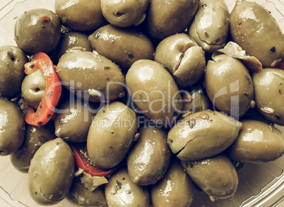 Green olives vegetables background vintage desaturated