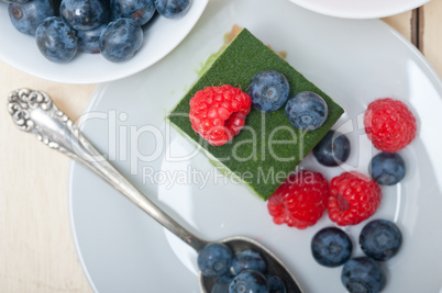 green tea matcha mousse cake with berries