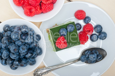 green tea matcha mousse cake with berries