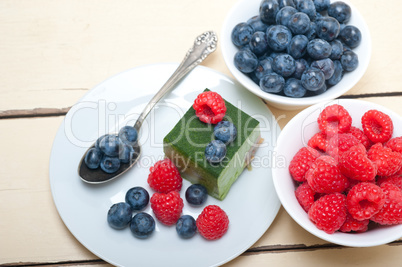 green tea matcha mousse cake with berries