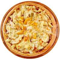 Fruit pizza with pineapple, peaches and apples