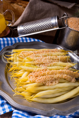 yellow string bean with bread crumbs