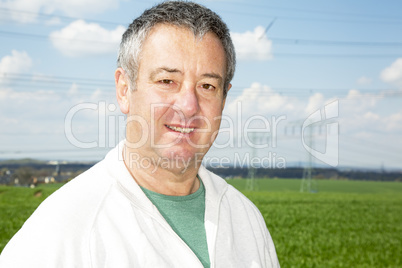 Portrait of farmer in front of his box