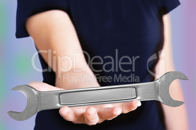 Hand with wrench