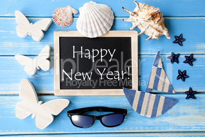 Blackboard With Maritime Decoration And Text Happy New Year