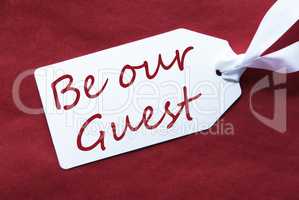 One Label On Red Background, Text Be Our Guest